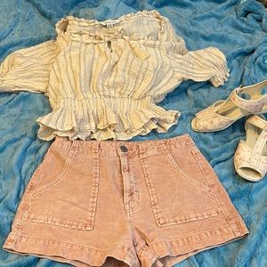 Blush pink thin-whale cord shorts by American Eagle
